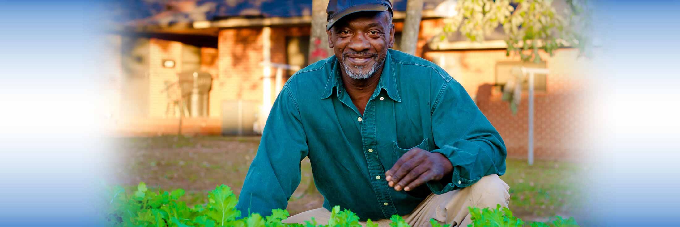 Middle-aged man tending to garden