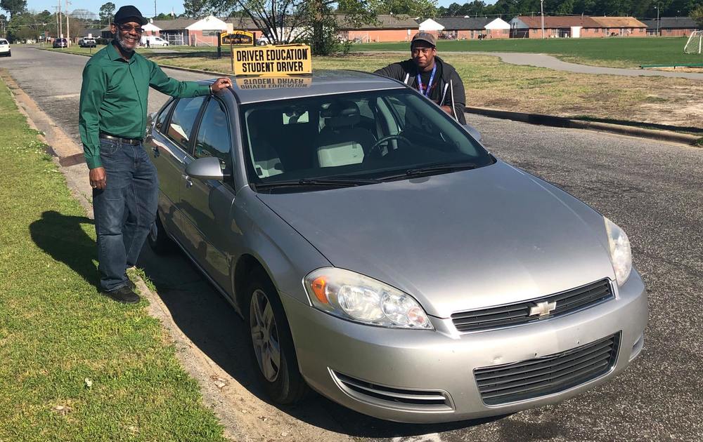 basic driving class participant getting in car