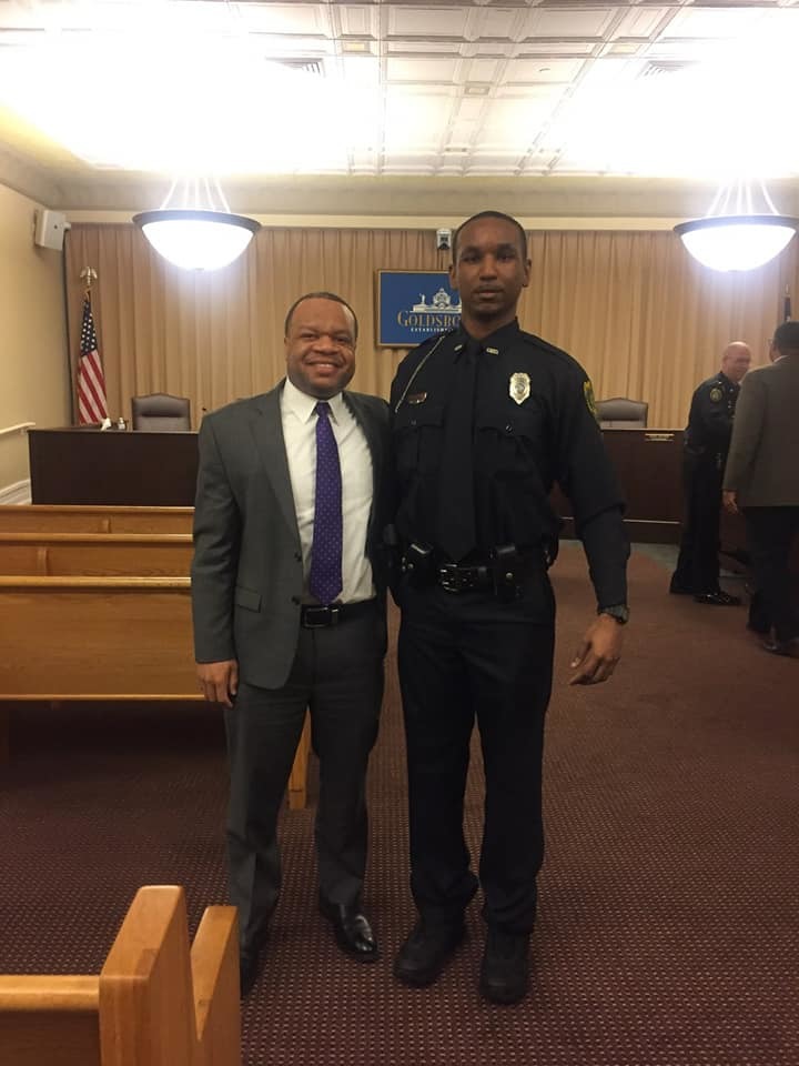 ceo goodson with ross program participant at police induction