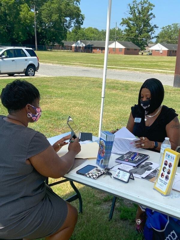 Mrs. Perkins and resident registering for ROSS program