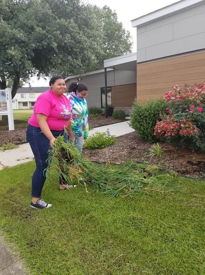 Teen Advisory Board Cleaning up Jobs Plus Outside