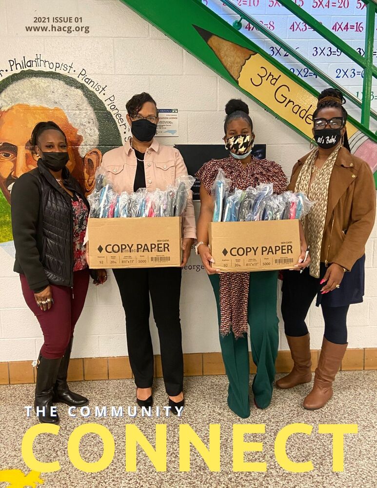 Community Connect 2021 Back Cover with Carver Heights Principal and Resident Services Staff posing with box of donated backpacks