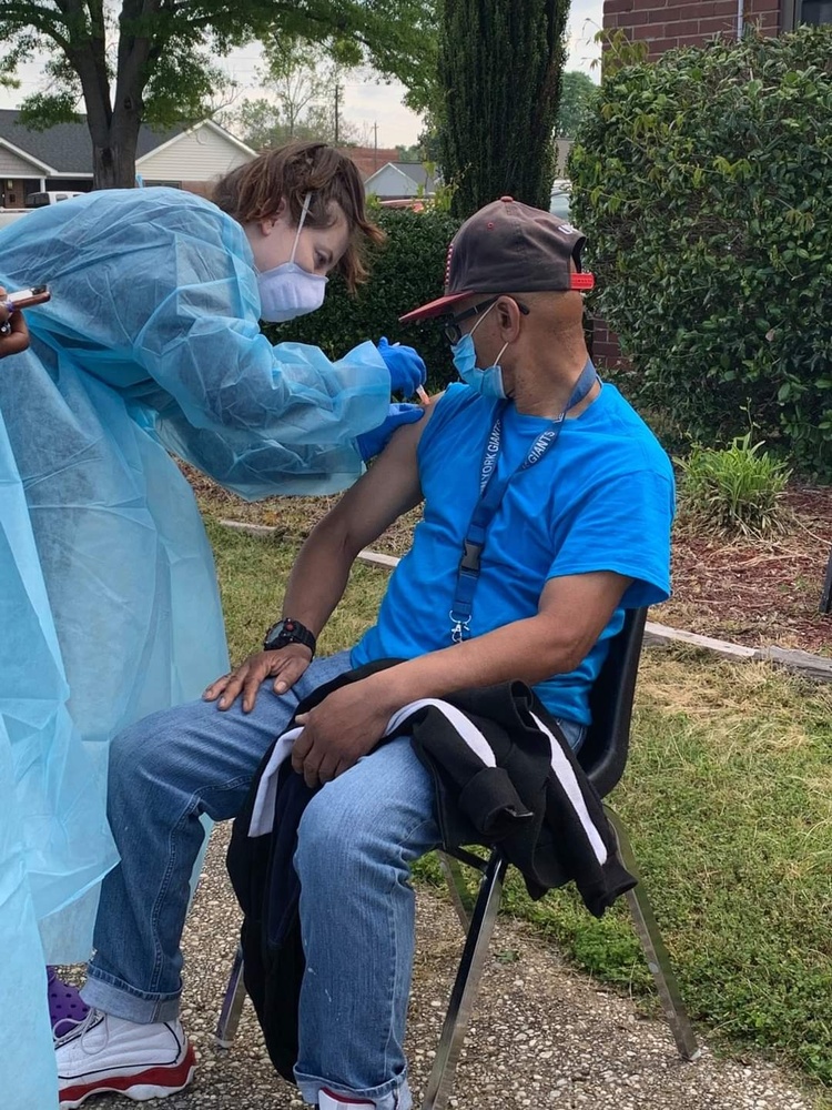 Covid Clinic resident receiving vaccine